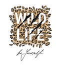 Wild life typography t-shirt design on leopard skin Royalty Free Stock Photo